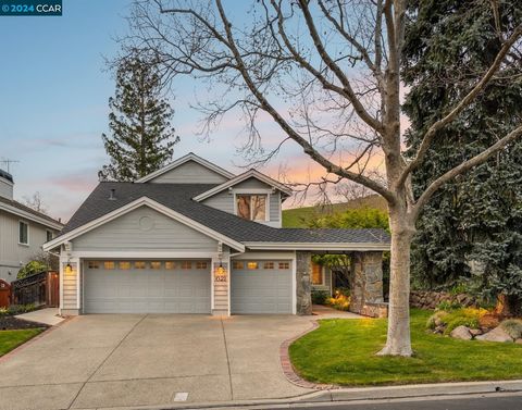 Located on a quiet cul-de-sac within the highly desirable Blackhawk Country Club, this home holds stunning views to the foothills of Mt Diablo & sits on the 15th green of the Lakeside Golf Course. This designer remodeled home offers high end finishes...