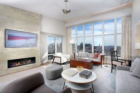 Premier top floor residence at Atelier 505 w/panoramic views of the South End and Downtown Boston. This home was gut renovated in 2022 and designed by award winning JOHN STEFANON DESIGN. Views galore from chef's kitchen equipped w/ top line appliance...