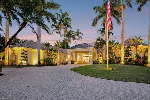 Come escape into this fully developed 2 acre Eastern exposure compound in Pine Ridge estates. With almost 9,000 sq. feet under air and over 22,000 sq. feet of additional exterior living space, this home is the epitome of the Naples lifestyle. The gra...