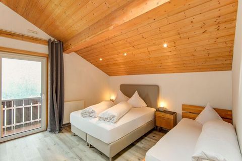 This detached holiday home for a maximum of 25 people is located in Sankt Gallenkirch-Gortipohl in Vorarlberg, right in one of the largest ski areas in Austria, the Silvretta-Montafon ski area. The holiday home consists of 4 different apartments, whi...