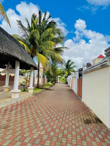 Kick back and relax in this calm, stylish space.This cozy 3 bedrooms villa with private pool and private kiosk is situated in a peaceful,calm and secure residence in grand baie near the beach.The villa consist of 3 bedrooms with 1 In suite(all aircon...