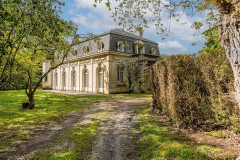 This picturesque property dating back to the 19th century, is nestled in the heart of a vast wooded park of 1.4 hectares, offering total privacy in a peaceful environment. The main house, with an area of 350 m², features remarkable period features su...