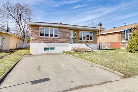 Welcome to this charming bungalow in Chomedey, nestled in a peaceful and family-friendly neighborhood. Conveniently located within walking distance of public transportation and local amenities, it is a testament to the meticulous maintenance of its o...