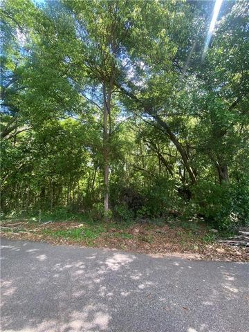 Located in south Mobile County this 1 acre wooded lot offers you a chance to build your dream home! Contact your favorite Realtor today! Buyer and buyers agent to verify any information the buyer deems important.