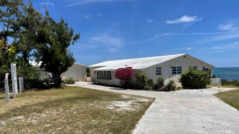 Stunning unobstructed panoramic ocean views from this ridge top property in a quiet enclave off Lighthouse Road in Grand Turk. Stretching along 0.57 manicured acres, this roomy 3 bedroom, 2 bath bungalow is beautifully maintained. Walkouts from the t...