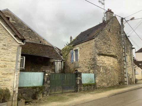 Located 12km from Montbard in a small village a charming house with work to be planned. The house is composed on the ground floor of a kitchen of approx 22m2, a bathroom of approx 4m2, separate toilet, a room of approx 24.5m2 with pretty stone firepl...