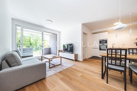 Modern one-room apartment with a garden on the ground floor of a new residential building NKP 66.30 m2. It consists of an entrance hall, bathroom, bedroom, pantry, open space kitchen, dining room and living room with access to the loggia and garden. ...