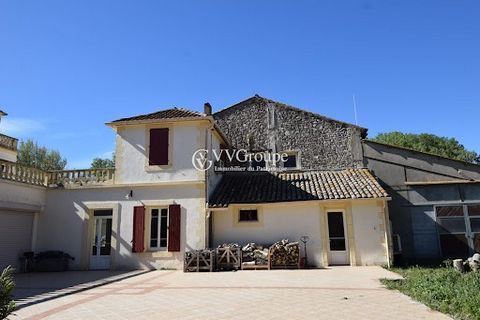 For sale, a renovated former wine estate of 1265 m2 in an agricultural zone, a manor house, 9 horse boxes, former wine cellar, office, swimming pool, 3 terraces on 2.8 hectares, 7 km from Narbonne and 20 km from Béziers. The renovated 19th-century es...