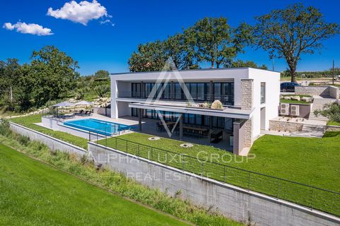 Istria, Grožnjan: Luxurious river Mirna and sea view villa For sale: An exquisite newly constructed villa in 2023, located near Grožnjan and Buje in Istria, situated on a plot of 1,728 m². This stunning property offers unobstructed views with a prote...