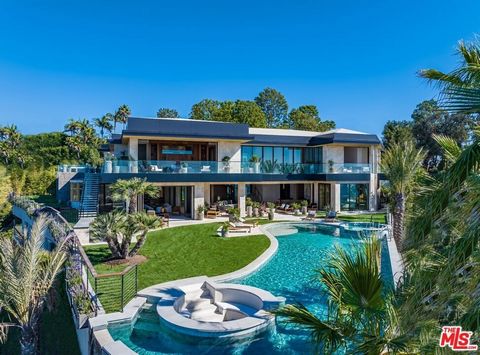 Welcome to this exclusive estate - gated and very private - located in Beverly Hills! This property is a rare find, with features that make it feel like a luxury resort where you can experience being on vacation every day. As you approach this amazin...