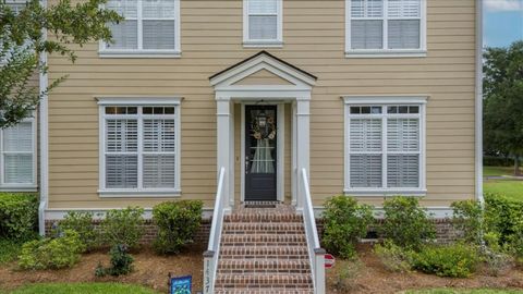 Nestled in the heart of Hamlin Plantation, this end-unit townhome exudes a refined elegance that is truly unmatched. Boasting an array of sophisticated features and upgrades, this stunning property offers a spacious formal living room/dining room com...