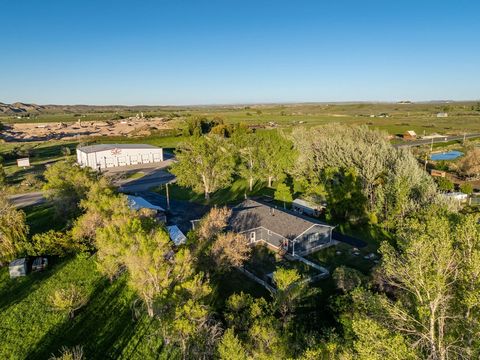 MOTIVATED SELLERS: DON'T MISS THIS ! Custom-Built Residence with Scenic Views of the Wind River Mountains. Crafted with meticulous attention to detail by a renowned local contractor in 2018, this charming abode exudes warmth and character. Boasting t...
