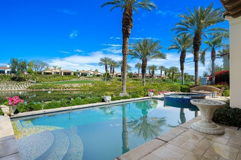 Lakefront Villa at Toscana! This stunning Bellagio 721 model overlooks a lake and provides panoramic views of mountains and #8 Fairway of the Jack Nicklaus Signature South Course. Offered Turnkey Furnished, this 4 bedroom/4.5 bathroom home has a deta...