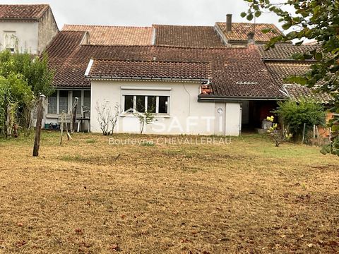Maison mitoyenne de 110m2 avec jardin + local professionnel