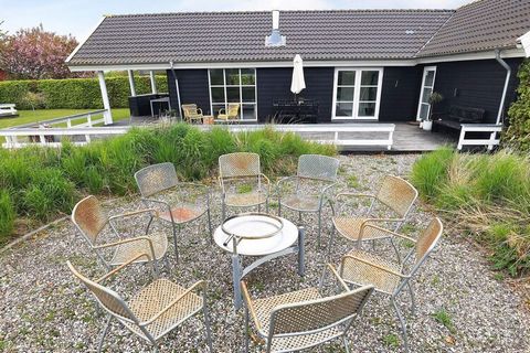 This holiday home with a hot tub is located at Hasmark Strand. The house has 3 bedrooms and a mezzanine. Large, combined living/dining room decorated with good furniture. From the living room there is direct access to the terrace where you can barbec...