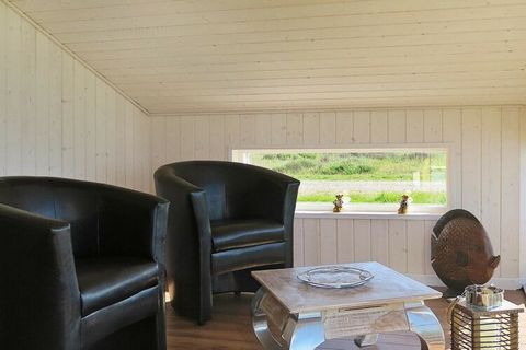 Holiday cottage with panoramic views Ferring Sø (lake). This well-functioning family cottage is furnished with 2 bedrooms, mezzanine, bathroom, living room, kitchen/dining room and wellness section with a 4 person whirlpool in elevated level, which o...