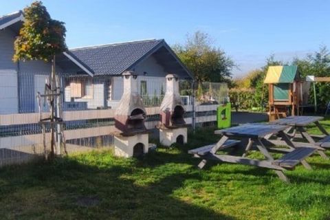 A family holiday resort in a quiet area, close to the beach and the resort center. The cozy holiday home consists of a living room connected to the kitchen, a bedroom (2 single beds that can be joined to form a double bed) and a bathroom with a showe...
