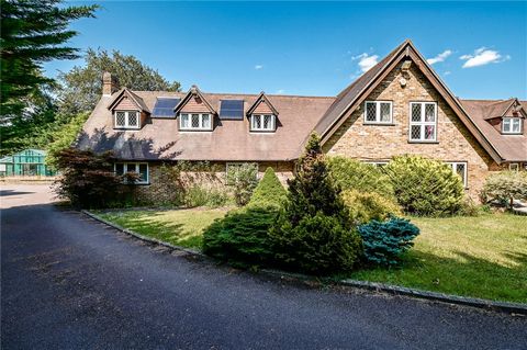 Fine and Country presents an exceptional opportunity for those seeking an expansive and versatile property, boasting approximately 13,400 square feet of living space on an impressive plot of approximately 0.9 acres, nestled within the charming villag...