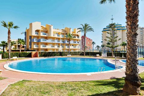 Great opportunity to purchase a 2 bedroom, 2 bathroom penthouse apartment with sea views in the popular complex of Miradores del Puerto in La Manga del Mar Menor Entering in to the apartment through the front door to the left hand side is a fully fit...