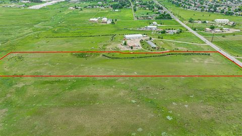 This rare offering is nestled in the vibrant city of Fort Collins, Colorado. This expansive lot presents a rare opportunity to own 10 acres of land in close proximity to both the serenity of open space and the bustling downtown area, offering an exce...