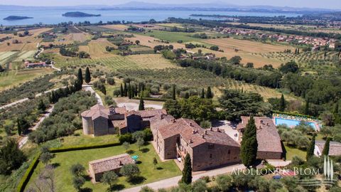 On a hill with unique lake views, charming 17th century hamlet upgraded with 31 bedrooms, swimming pool and park for sale near Tuoro sul Trasimeno, Perugia. On a hill overlooking Lake Trasimeno, a classic 17th century farm once part of the estate of ...