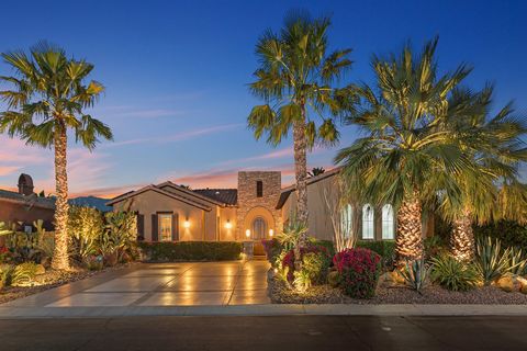 Lakeside Living at it's best in the Desert! This stunning Tuscan home in the gated community of Santo Tomas with it's 9-acre lake, boat launch and walking paths has magnificent panoramic views that extend from the Infinity Pool along the length of th...
