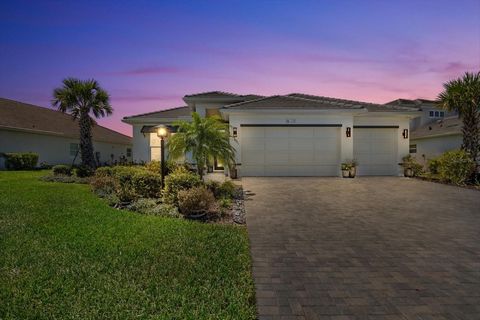 UPGRADES GALORE !!! Whole home impact windows and doors. Many custom features added; Extended driveway, Custom Kitchen layout, added window, extended quartz island, extended cabinets. Z Line appliances, porcelain tile backsplash, custom upgraded pull...
