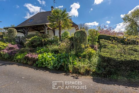 It is on the heights of a charming hamlet that this house Ile de France was built in the 70s. The family building of 180m2, with multiple possibilities of development, benefits from an ideal location between CAEN and the sea, in a privileged setting,...
