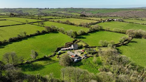 Fine Country West Wales are pleased to bring the delightful smallholding of Glyncoch onto the market. This five bedroom detached farmhouse offers a wonderful smallholding / lifestyle opportunity situated in a West Wales rural location. Offering attra...