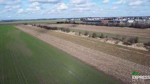 Technical and production plot with an area of 8535 m2 in Plewiska, 400 m from the A2 motorway An investment plot for technical and production purposes for sale in the town of Plewiska, at Szkolna Street, Wielkopolska Voivodeship, Poznań District, rig...