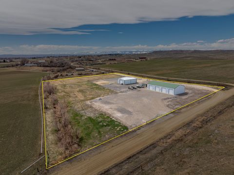 Property consists of two parcels, one with a shop/home combination and one with a 5000 sq.ft. shop building.Total acreage is 5.73, split in to two parcels, one is 2.30 acres, the other is 3.43 acres. The Shome consists of a 1260 sq.ft. living area wi...