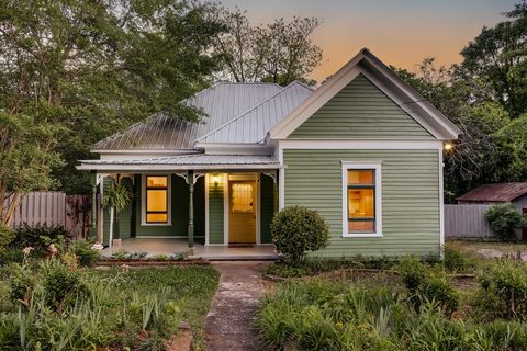 This turn of the century Folk Victorian is the quintessential historic Athens home you've been waiting for! Move-in ready condition with fresh paint inside and out. The exterior paint colors were chosen as an homage to the funky and fun colors of 