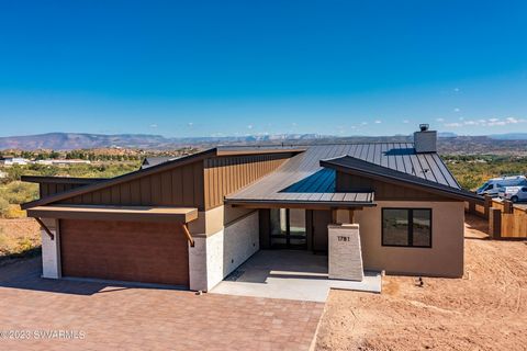 Located in the picturesque foothills of Clarkdale is this Custom, Jamison Builders home, with stunning distant views of Sedona. Designed with complete luxury and energy efficiency in mind, the list of features is extensive (see attached for full list...