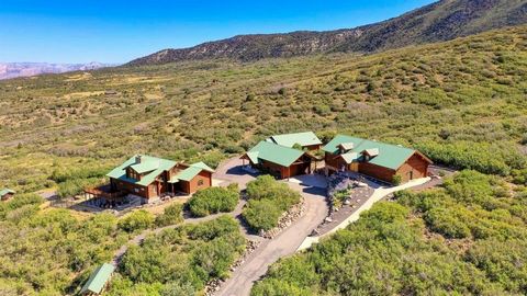 Escape to Paradise: Your Private Mountain Retreat AwaitsÂ Imagine waking up to breathtaking panoramic vistas, the crisp mountain air invigorating your senses. This dream becomes reality at this stunning 35-acre mountain retreat nestled on the gentle ...