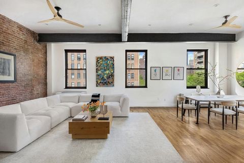 Extraordinary. This duplex loft in Chelsea will simply take your breath away. A former dance hall from the 1920's has been transformed into a spectacular home with 12-foot ceilings, massive exposed steel beams, and an incredible private terrace. A li...