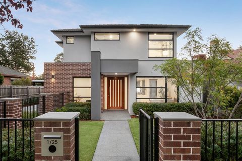 Owning a coveted position in a quiet, tree-lined street just minutes from Chadstone and East Malvern train station, this stunning, street-front three-bedroom contemporary residence’s impeccably presented and spacious dimensions provide a secure and s...
