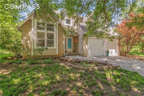 Welcome to your quiet oasis nestled just minutes from the City! Sitting on almost an acre of land, this charming 1.5 story home is just a quick 10 minute drive from all of the excitement and convenience of The Legends area. You will love this quiet n...