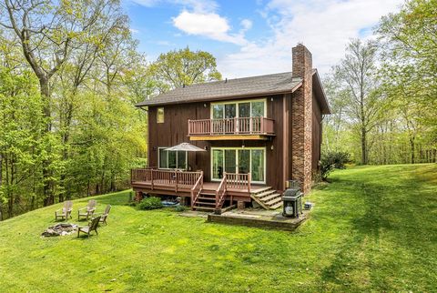 Charming contemporary on 1.96 acres with beautiful views of Stissing Mountain. This three bedroom, two and one half bath home provides 1,944 square feet and a spacious layout between the rooms and wonderful outdoor living spaces. The living room offe...