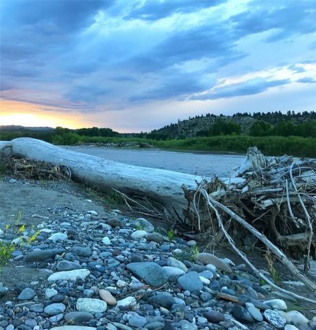 Yellowstone Riverfront Property: 20 +/- acres. The majority of the property is elevated from the river, providing ample level build sites for your dream home and guest house. Lot may be used for residential or recreational purposes, per covenants. Th...