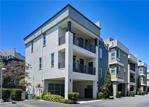 Nestled in the heart of the vibrant coastal community of Costa Mesa, this stunning three-story residence offers an unparalleled blend of modern luxury and breathtaking ocean views. Built in 2017, this home boasts an array of upscale features includin...