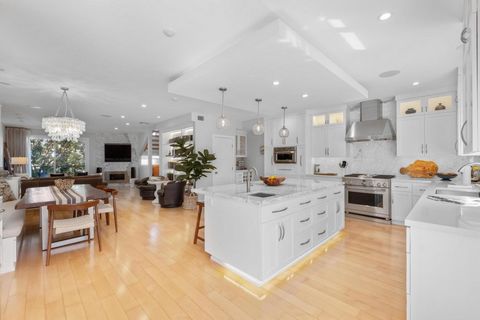 Experience modern comfort in this beautifully upgraded 4-bedroom, 4-bathroom home. Spanning 2,400 sq. ft. on an expansive 30,008 sq. ft. lot, this residence boasts an open-concept main level with custom hardwood kitchen cabinetry, a built-in banquett...