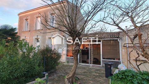 Située à Nieulle-sur-Seudre, cette propriété s'inscrit au cœur d'un charmant village