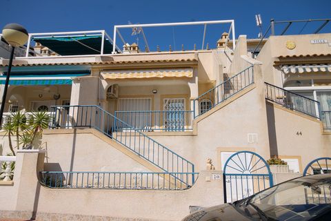 Situated in the popular urbanisation of Blue Lagoon, close to Villamartin, we offer this two bedroom mid terrace house. It comprises of a sunny south west facing terrace which benefits from an open view towards landscaped parkland. There is a storage...