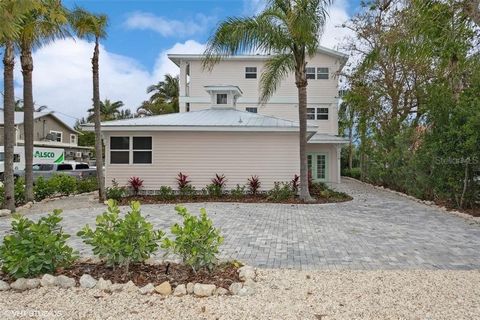 You won't want to miss this opportunity to own your very own slice of paradise in this completely and beautifully renovated 3 story home located right behind the Sand Bar Restaurant, just steps away from the salty air, sparkling blue waters, and powd...