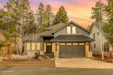 Delighted to present this exquisite, custom-built 4-bedroom, 3-bathroom residence nestled within the prestigious FLAGSTAFF RANCH GOLF COMMUNITY. Meticulously crafted with timeless architectural allure and built in 2017, this home epitomizes refined m...