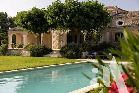 For sale in Maussane-les-Alpilles. In the heart of the old village this property of approx 230 m2 hab is set on pretty garden that is organized in different terraces and relaxation area around a heated pool. On the ground floor, we have beautiful liv...
