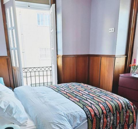 The Bedroom has two balconies, an ensuite bathroom, hanging clothing space and a dresser. A king size bed, workplace and heating is also available. Welcome to the historical center of Braga! The Chaplain house has been recently renovated, and its sur...