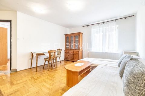 Zagreb, Voltino. Furnished two-bedroom apartment for rent on the first floor of a newer building on Golikova Street. It consists of a living room with a kitchen and dining area, a bedroom, a bathroom, and an entrance hallway. The dining area is separ...