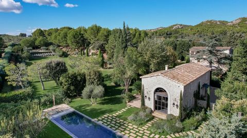 Set in the countryside around Maussane les Alpilles, in an idyllic and sought-after, but not isolated, location this fabulous property is composed of 2 stone houses right in the heart of the Alpilles. The main house, in a rustic style, spans just und...