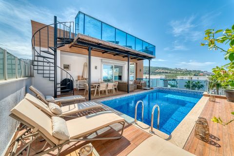 Luxurious Scandinavian-Style Villa with Private Pool in Kargicak Escape to paradise in this stunning villa nestled on a Kargicak hillside, offering breathtaking views of the Mediterranean. This contemporary property is part of a residential complex w...